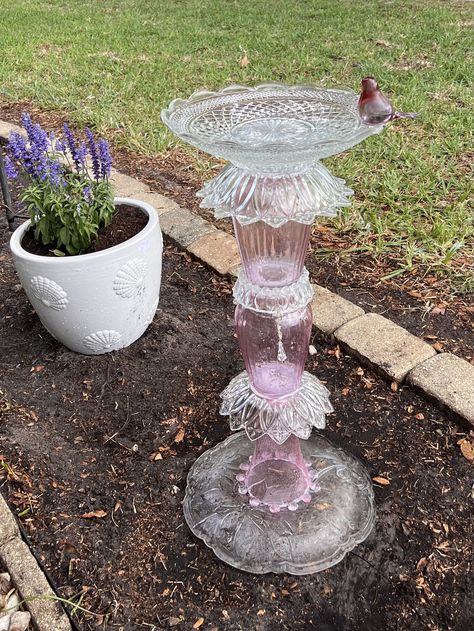 Birdbath - repurposed glass 4/24. I used vases,flower bowls, old Christmas plate for the bottom for weight and an Anchor hocking bowl for the bath.  Added a few crystals from an old chandelier and a cute glass bird. Bird Baths, Diy Glass Bird Bath, Bird Bath Pedestal Repurpose, Diy Bird Bath Dollar Store, Glass Bird Baths Yard Art, Unique Bird Baths Glass, Concrete Birdbath Base Repurpose, Diy Bird Bath Upcycle Glass Bowls, Unique Bird Baths