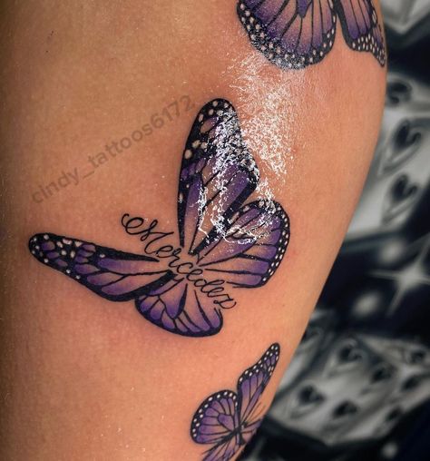 Garden Grove CA 📍🦋👑 | 💜 Purple @low_n_slow_tattoo_studio #purplebutterfly #butterflytattoo #butterfly #butterflynails #tattooideas #tattooideasforgirls… | Instagram Purple And Green Butterfly Tattoo, Butterfly Thigh Tattoo Black Women, Butterfly Strength Tattoo, Purple Butterfly Tattoo Memorial, Butterfly With Date Tattoo, Purple Tattoo On Dark Skin, Purple Tattoos For Women, Butterfly Tattoo Women, Slow Tattoo