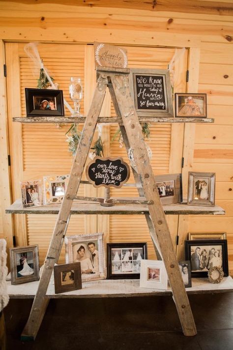 Pictures For Wedding Centerpiece, Ladder Wedding Decoration, Ladder Shelf Wedding Display Ideas, Ladder Picture Display Wedding, Wedding Ladders Decoration, Wedding Ladder Display, Wooden Ladders Ideas Decor Wedding, Picture Ladder Photo Displays, Wood Ladder Wedding Decor