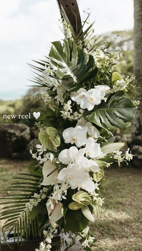 Wedding Aisle Arch Ideas, Monstera Leaves Wedding Decor, Overhead Decor Wedding, Hawaii Outdoor Wedding Reception, Tropical Beach Wedding Ceremony, Tropical Leaves Wedding Decor, White Tropical Flower Arrangements, All White Tropical Wedding, Cancun Wedding Flowers