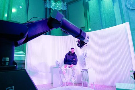 There were also several interactive video booths designed for content sharing. One was a robotic “Glambot” arm (pictured) that gave guests a chance to model their headphones as they stepped into the product photography key art to be featured in their own Bose ad. The other was a karaoke experience inside a Porsche; guests could sit in the vehicle, grab the mic, and sing along to the headliners’ tracks—highlighting Bose’s audio integration with Porsche and creating another fun, shareable moment. Mirror Booth, Scary Farm, Marketing Activations, Video Booth, Interactive Video, Key Art, Experiential Marketing, Anniversary Event, Photo Booths