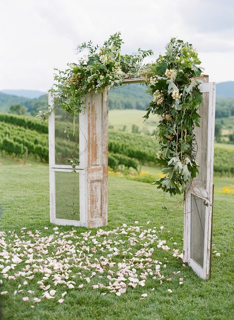 Photography: Josh Gruetzmacher Photography - joshgruetzmacher.com  Read More: http://www.stylemepretty.com/2015/02/03/rustic-charm-pippin-hill-wedding/ Hiasan Perkahwinan, Pippin Hill Wedding, Outdoor Country Wedding, Diy Wedding Arch, Wedding Arbors, Majlis Perkahwinan, Wedding Arch Rustic, Wedding Doors, Rustic Outdoor Wedding