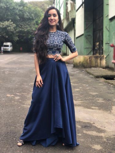 A skirt with the crop top is always in fashion. The crop top can be contrasting and matching both. The choice is yours.   #shraddhakapoor #celebrity #ethniclook Simple Lehenga, Lehnga Dress, Long Skirt Outfits, Blue Lehenga, Crop Top Designs, Bollywood Outfits, Indian Gowns Dresses, Trendy Dress Outfits, Ethnic Looks