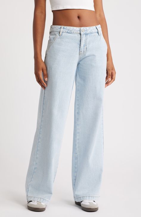 A low-rise waist complements the slouchy silhouette of these nonstretch-denim jeans cast in the perfect faded wash. 32 1/2" inseam; 22" leg opening; 10" front rise; 14 1/2" back rise (size 29) Zip fly with button closure Front slant pockets; back patch pockets 100% cotton Machine wash, tumble dry Imported Light Wash Denim Trousers, Blue Baggy Jeans, Baggy Wide Leg Jeans, Cute Running Shoes, Low Rise Baggy Jeans, Wide Legged Jeans, Blue Mom Jeans, Light Denim Jeans, Jeans Low Rise