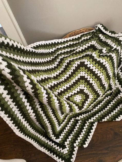 #green #crochet #blanket #handmade Green Black And White Crochet Blanket, Crochet Green And White, Granny Square Crochet Blanket Aesthetic, Granny Square Blanket Green, Green And Black Crochet Blanket, Green And Brown Crochet Blanket, Black And Green Crochet, Crochet Dark Green, Green Blanket Crochet