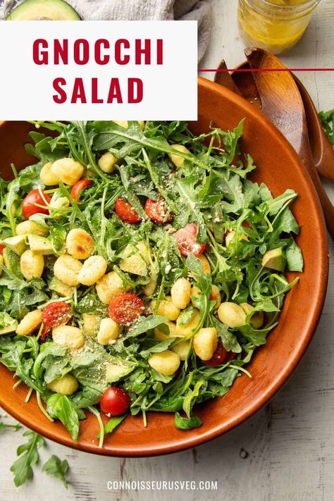 This gnocchi salad is made with peppery arugula, juicy cherry tomatoes, and avocado chunks along with oven-toasted gnocchi in a zippy lemon vinaigrette! It's makes a delicious vegan show-stopping side, or you can double up the servings and enjoy it as a main. Toasted Gnocchi, Gnocchi Salad, Avocado Chunks, Salad With Lemon Vinaigrette, Recipes With Parmesan Cheese, Baked Gnocchi, Vegan Dinner Recipes Easy, Salad With Lemon, Vegan Pasta Recipes