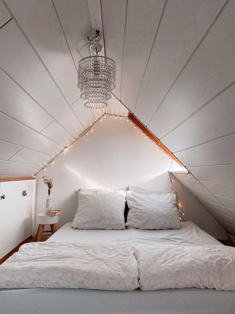 White & cozy attic bedroom/small bedroom ideas/minimalist/minimalistic interior/white bedroom/diy/bedroom ideas/simple Tiny Bedroom Attic, Room Ideas Attic Bedrooms, Tiny Attic Bedroom Ideas, Triangle Roof Bedroom Ideas, Tiny Attic Room, Small Attic Bedrooms, Tiny Attic Ideas, Tiny Attic Bedroom, Cozy Loft Bedroom