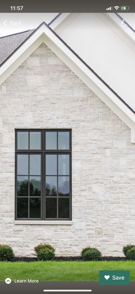 White Brick And Stone Exterior Farmhouse, White Stone Siding Exterior, White And Grey Stone House Exterior, White Stone On Front Of House, Garage Doors On White Brick House, White Stone Houses Exterior, White Transitional Home Exterior, White Stucco With Stone Exterior, Ivory Stone House Exterior