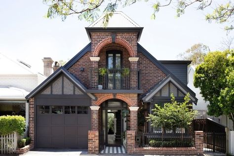 8 Siding Colors That Go Beautifully With Red Brick Exteriors | Hunker Red Brick Black Garage Door, Red Brick With Black Siding, Red Brick And Stucco Exterior Houses, Stucco And Red Brick Exterior, Dark Brown Brick House Exterior, Modern Red Brick House, Brick House Porch, Red Brick House Exterior Colors Schemes, Orange Brick House Exterior