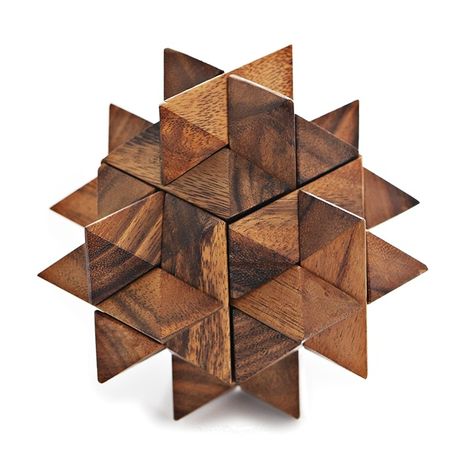 The Giant Star is a puzzle created by interlocking wooden pieces - the original puzzle hails from India when a prince dropped a star he caught and frantically reassembled it. For those who embrace a challenge. http://www.beehattan.com/collections/creative-classic-puzzles-and-games/products/monkey-pod-games-the-giant-star-puzzle Tshirt Drawing, Monkey Pod Wood, Giant Star, Rustic Glam, Falling Stars, 3d Puzzles, Wood Toys, Soft Dolls, Brain Teasers