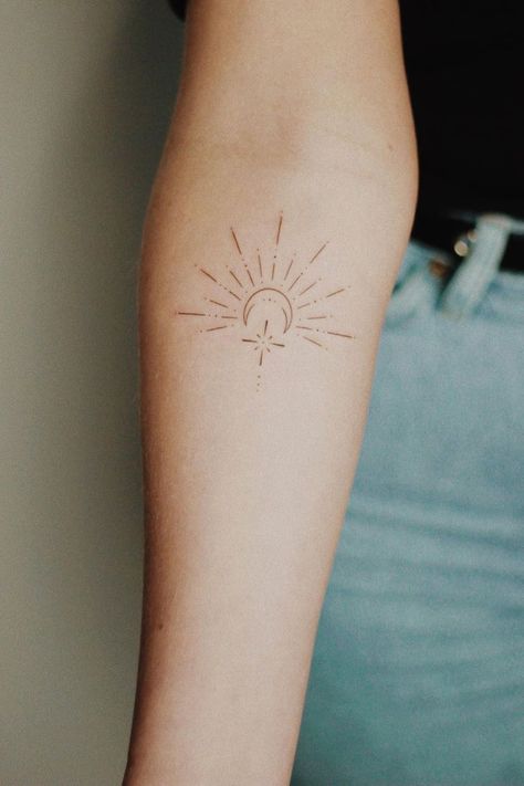 38 Amazing Small Sun and Moon Tattoo Ideas Sun And Moon Wrap Around Tattoo, Half Sun Wrist Tattoo, Free Spirit Wild Heart Tattoo, Sun Name Tattoo, Sun Tattoo Elbow Crease, Sun And Moon Stars Tattoo, Midnight Sun Tattoo, Sun And Moon Tattoo Placement, Fineline Sun And Moon Tattoo