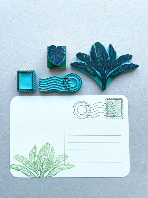 Set of 4 hand carved rubber stamps of postage stamping for summer traveling ideas. The set includes: - One postage stamp design size: about 1" tall (2.5cm) - One postage seal stamp size: 2.25" wide (5.5cm) - One Banana leaves  stamp size: 3.35" (9cm) - One mini Monstera leaf stamp size: almost 1" tall (2.5cm) They all come with wood base for easy stamping and inside a box for easy storage. (Inks are not included) - Uses: stamp on postcards, notebooks, bookscraping, traveling journal and more Tha Traveling Journal, Rubber Stamps Diy, Homemade Stamps, Eraser Stamp, Postage Stamp Design, Hand Carved Rubber, Linoleum Print, Lino Art, Hand Carved Stamps