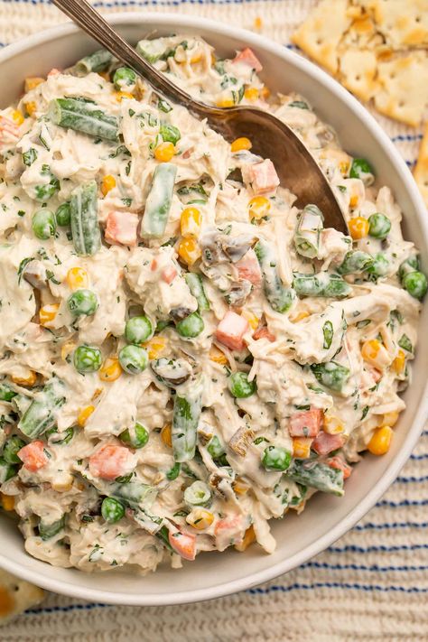 Mexican chicken salad is tender shredded chicken tossed in a creamy sauce with mixed veggies, fresh cilantro, and jalapeños… Tons of flavor! One of my favorites from my time in Texas and California, this is a great dish to serve at any potluck, cookout, or BBQ and will be gone in no time. Delicious on tostadas, with saltines for dipping, as a sandwich, or even eaten straight with a fork! Mexican Chicken Salad, Cold Chicken Salads, Lemon Pepper Chicken Breast, Shredded Chicken Salads, Mexican Chicken Salads, 40 Aprons, Keto Chicken Salad, Mixed Veggies, Jalapeno Chicken