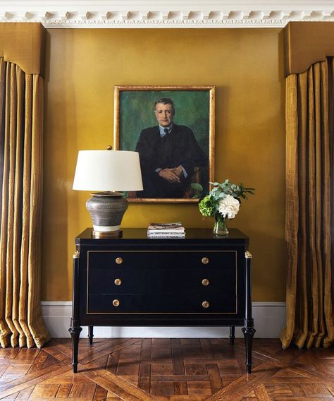 Mustard Feature Wall, Yellow Hallway, Hallway Walls, Mustard Walls, Chippendale Chairs, London Townhouse, Townhouse Designs, Yellow Room, Wooden Cabinet