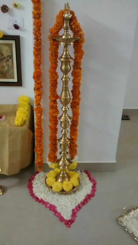 House Warming Decoration Gruhapravesam Decoration Ideas, Diya Stand Decoration, Stand Decoration Ideas, Lamp Decoration Ideas, Gauri Decoration, Diya Stand, Traditional Lamp, Home Flower Decor, Diwali Decorations At Home