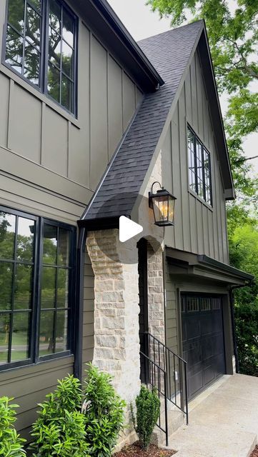 AMBER | New Build Designer on Instagram: "If you are looking for a dark and moody exterior paint color…look no further! 👀This was my first time using this color and definitely won’t be my last! 🖤  “Limestone” SW 9599 by @sherwinwilliams   #paintcolor #homebuilding #homedesign #homeexterior #homedecor #interiordesign #exteriordesign #sherwinwilliams #newconstruction" Moss Green Exterior House Paint, Wooden Exterior House Color Schemes, Ashwood Moss Benjamin Moore Exterior, Collingwood Benjamin Moore Exterior, Exterior Dark Paint Colors For House, Thunderous Sherwin Williams Exterior, Sw Rock Bottom Exterior, Dark Exterior House Colors With Brick, Sw Retreat Exterior