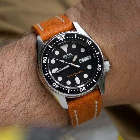 Seiko SKX013, an overlooked icon. Do you wish you had gotten one? | WatchCrunch Seiko Skx 013, Seiko Skx013, Seiko Skx, Divers Watch, Crystal Shapes, Vibrant Orange, Many People, Watch Strap, Get One