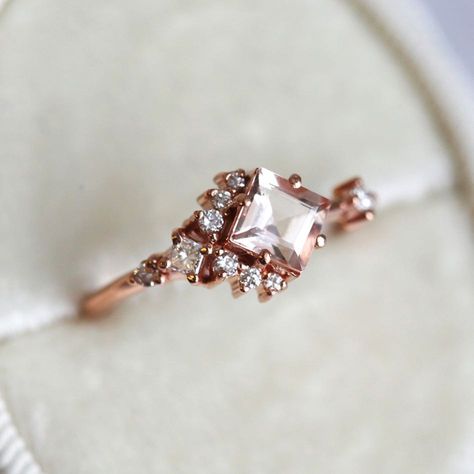 Cluster rings are our favorites 💕 This one has Morganite as the central stone accompanied with smaller diamonds for that extra sparkle ✨ what do you think? 😊 Asymmetrical Engagement Ring, Engagement Ring Morganite, Asymmetrical Ring, Engagement Ring Sapphire, Sapphire Cluster Ring, Morganite Diamond Ring, White Sapphire Engagement Ring, Morganite Diamond, Princess Ring