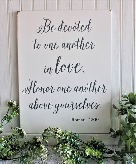 Be devoted to one another in love Honor one another above yourselves. Romans 12:10 What a wonderful verse to display at your wedding and then as a reminder to hang in your home.  A great wedding gift idea, On a white painted worn finish with black lettering. This sign measures 12x16 inches. Signs are made of ½ inch mdf, a wooden building material which is smooth, without knots and makes for a much nicer finished sign. Each sign is cut to shape and painted with acrylic paint and sanded. The desig Godly Wedding, Christ Centered Wedding, Wedding Bible Verses, Romans 12 10, Wood Sign Wedding, Wedding Bible, Bible Verse Signs, Anniversary Sign, Great Wedding Gifts