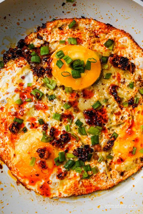 Eggs And Olives, Crispy Cheese Eggs, Chili Eggs Breakfast, Recipes With Chilli Oil, Chili Crisp Eggs, Chilli Oil Eggs, Egg Confit, Chili Oil Eggs, Chilli Eggs