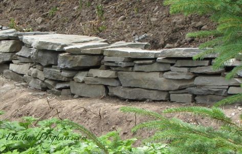 DIY Stacked Stone Retaining Wall – Part 2 – DustandDoghair Stone Garden Wall, Homesteading Diy Projects, Dry Stack Stone, Stacked Stone Walls, Sloped Yard, Homesteading Diy, Stone Retaining Wall, Garden Flower Beds, Building A Pergola