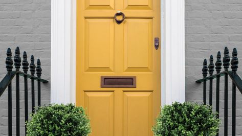 Three front-door makeovers that make an entrance | Dulux Mustard Yellow Front Door, Green Porch, Dulux Exterior Paint, Bold Front Door, Yellow Front Door, Front Doors Uk, Painting Trim White, Yellow Front Doors, Brick Houses