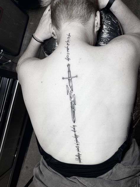 spine back not all who wander are lost the best adventures are always unexpected line work black ink white flower men Elvish Spine Tattoo, Lotr Back Tattoo, Lord Of The Rings Spine Tattoo, Lord Of The Rings Chest Tattoo, Lotr Spine Tattoo, Lord Of The Rings Tattoo Small, Lord Of The Rings Tattoo Minimalist, Aragorn Tattoo, Shards Of Narsil Tattoo