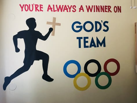 Sunday School Olympics, Bible Olympics For Kids, Olympic Classroom Door, Olympic Vbs Crafts, Olympic Door Decorations For School, Olympic Bulletin Board Ideas, Olympic Vbs, Olympic Bulletin Board, Vbs Olympics