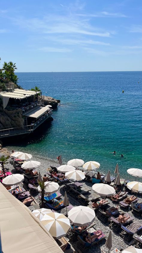 Beach in the south of France with a restaurant on the cliff and lots of beach umbrellas near the water Castel Plage Nice, Saint Jean Cap Ferrat, Nice Cote D Azur, Mediterranean Aesthetic, France Aesthetic, French Summer, Nothing But Love, Travel Around Europe, I Have Nothing