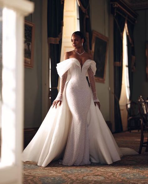 ALONUKO BRIDAL on Instagram: "OPU-08 | The gown is adorned with elegant beading, featuring a plunge neckline and expertly crafted off-shoulder draping. Adding a contemporary touch, the detachable beaded point-edge sleeves provide a modern edge.  #alonukobridesdoitbest" Glam Wedding Dress, Classy Wedding Dress, Stylish Wedding Dresses, Afrikaanse Mode, Fancy Wedding Dresses, Womens Wedding Dresses, Fancy Wedding, Dream Wedding Ideas Dresses, Bride Gowns