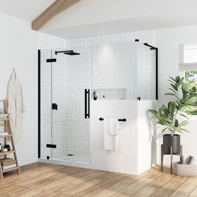 This shower kit with buttress panel features a fixed panel hinge system, offering an industrial-inspired look that will complement any space. It comes with premium quality oversized hardware complete with a Satin Nickel finish, and includes a 10 in. wide fixed panel, a 24 in. wide door panel, a 24 in. wide buttress inline panel, a 30 in. wide buttress side panel, ideal for a Buttress Corner installation. All panels are made from Premium 8mm (5/16") thick certified tempered glass. Frame Finish: Shower Buttress Wall, Toilet Privacy Screen Bathroom, Shower Remodel Half Wall, Cottage Primary Bathroom, Walk In Shower With Half Wall And Glass Door, Glass Shower Doors Frameless Half Walls, Half Shower Glass Door, Bathroom With Standing Tub, Modern White Bathroom Design