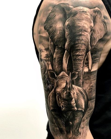 200+ Amazing Tattoo Designs & Ideas That You'll Love! African Sleeve Tattoo, Rhino Tattoo, Africa Tattoos, Animal Sleeve, Wildlife Tattoo, Animal Sleeve Tattoo, Gorilla Tattoo, Lion Tattoo Sleeves, African Tattoo