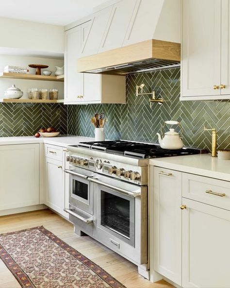 kitchen, cream cabinets with cream marble countertop, green tile backsplash, floor runner, stainless steel oven, gold hardware Green Kitchen Backsplash, Green Tile Backsplash, Green Backsplash, Interior Dapur, Kabinet Dapur, Herringbone Backsplash, Beige Kitchen, White Kitchen Decor, Gold Kitchen