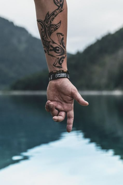 Picture of detailed vegan tattoo on forearm with beautiful lakes and mountains in the background. Shark Tattoo Meaning, Unique Wrist Tattoos, Forearm Band Tattoos, Vegan Tattoo, Band Tattoos, Wrist Tattoos For Guys, Shark Tattoo, Shark Tattoos, Cool Small Tattoos