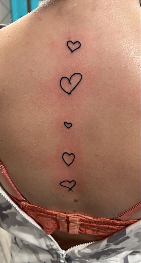 #tattoo #tattooideas #spinetattoosforwomen #spinetattooideas #hearts #hearttattoos Heart Tattoo On Spine, Hearts Down Spine Tattoo, Heart Spine Tattoos For Women, Heart Tattoo Spine, Heart Spine Tattoo, Back Heart Tattoo, Heart Back Tattoo, Tattoo Down Spine, Vertical Tattoo