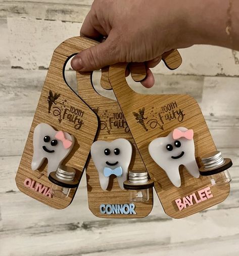 Explore creative animal puzzle designs perfect for Etsy selling featuring lasercut designs and digital drawings. Tooth Fairy Ideas, Tooth Fairy Door Hanger, Xtool Projects, Door Hanger Baby, Tooth Fairy Door, Tooth Fairy Doors, Glowforge Ideas, Fairy Ideas, Baby Door Hangers