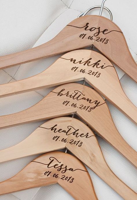 Bridesmaid Gift Ideas Under $150 That Are Just Perfect Personalized Bridesmaid Hangers, Bridesmaid Hangers, Personalized Hangers, Bridal Hangers, Wedding Dress Hanger, Laser Engraved Ideas, Dress Hanger, Wedding Hangers, Personalized Bride