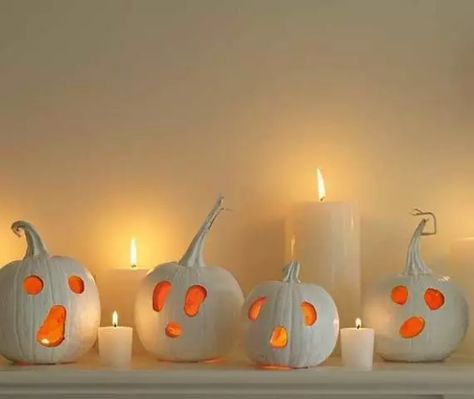 white ghost pumpkins as jack o lanterns for Halloween are a simple and cool solution that you can easily DIY White Ghost Pumpkin, Carved White Pumpkin, Halloween Fireplace, Ghost Crafts, Halloween Fest, Halloween Craft Projects, Halloween Ghost Decorations, Hallowen Ideas, Casa Halloween