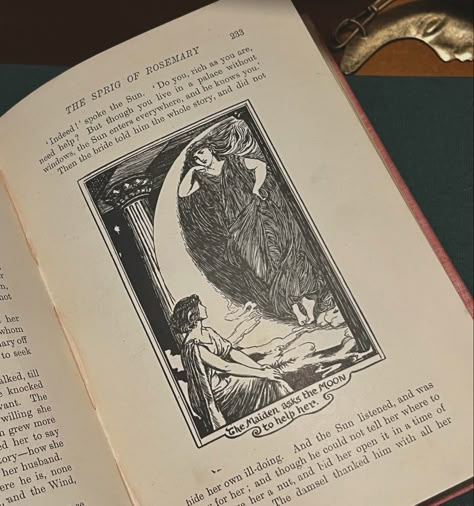 vintage book open to illustration of a fairy and the moon laying on a desk Medieval Books Aesthetic, Dark Academia Fairycore, Emily Wilde's Encyclopaedia Of Fairies Aesthetic, Fairy Book Aesthetic, Inkheart Aesthetic, Male Fairy Aesthetic, Story Book Aesthetic, Elfcore Aesthetic, Fairy Aesthetic Dark