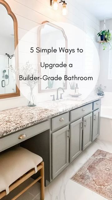 Kimberly Niarhakos on Instagram: "⭐️ 5 easy ways to make major changes to your builder-grade bathroom without spending a fortune!! ‌ ✨ Comment { 𝙻𝙸𝙽𝙺 } to have all the items I used for this glow up sent to your DM’s!! ✨ 1. Remove builder grade mirror -Add framed Mirrors 2. Update faucets 3. Change lighting 4. Paint cabinets & add new hardware 5. Paint, and or add accent wall/walls with wallpaper, shiplap, etc. ‌ 🌻 Full blog post tutorial 🌻 over on the blog linked in my bio if you want to see more details to this makeover!! 🫶🏻 Have a great Wednesday friends!! 💛 . . . . . #augustvibesharing . #LTKhome #homeswithsoul #homestyle #homeswithcharacter #homeblogger #diyhomeprojects #diyinspo #diyinsporation #vintagestylehomes #homestyle #homedesignideas #loveyourhome #easyhomedecor #i Update Bathroom Hardware, Easy Bathroom Vanity Makeover, Adding Hardware To Bathroom Cabinets, Repaint Builder Grade Cabinets, Master Bath Ideas Builder Grade, Small Builder Grade Bathroom Remodel, Guest Bathroom Ideas Decor Builder Grade, Contractor Grade Bathroom Makeover, How To Upgrade Builder Grade Cabinets