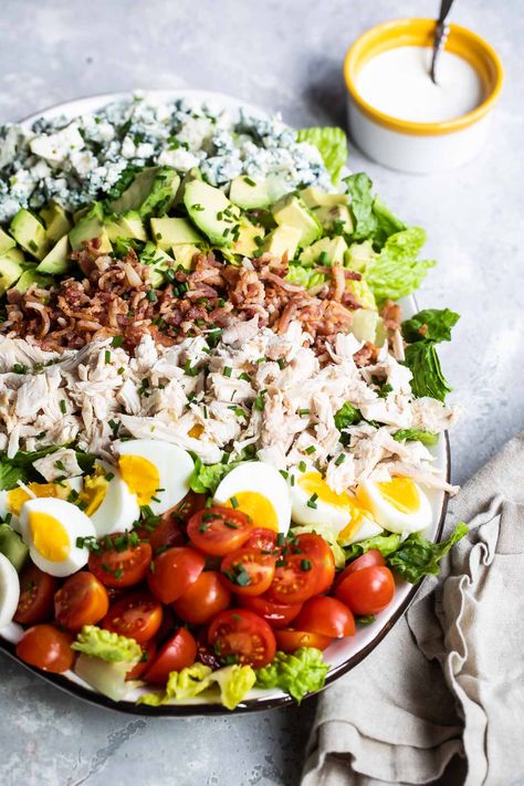 A cobb salad composed on a platter. Cobb Salad Ingredients, Creamy Balsamic Vinaigrette, Avocado Dressing Recipe, Cobb Salad Recipe, Salads Recipes, Grape Salad, Ambrosia Salad, Salad Recipes For Dinner, Summer Salad Recipes