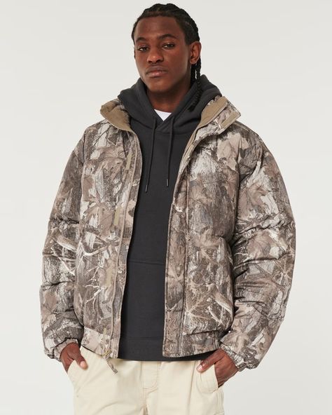 Men's Boxy Mock-Neck Camo Puffer Jacket | Men's Clearance | HollisterCo.com Khaki Tactical Hunting Outerwear, Camo Puffer Jacket, Camo Hoodie Hollister, Brown Military Style Hunting Outerwear, Puffer Jacket Men, Military Hunting Outerwear With Pockets, Military Camouflage Hooded Jacket For Outdoor, Teen Clothing, Neck Collar