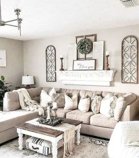 a chic neutral farmhouse living room with a tan sectional, a shelf with shutters and wooden candlesticks, a low coffee table Cozy Farmhouse Living Room, Modern Farmhouse Living Room Decor, Серая Кухня, Farmhouse Living Room Decor Ideas, Living Room Wall Decor Ideas, Rustic Farmhouse Living Room, Room Wall Decor Ideas, Living Room Sofa Design, Modern Farmhouse Living Room