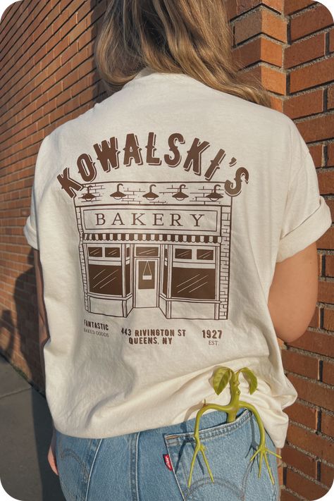 Cozy up in our BAKERY crewneck sweatshirt. This soft, oversized sweatshirt is perfect for lounging around or running errands. #bakery #sweatshirt . #Hippies #Cute_Work_Shirts_With_Logo #Concert_T-shirt_Design #T_Shirt_Font_Design Cute Work Shirts With Logo, T Shirt Font Design, Logo Tshirt Outfits, Restaurant Tee Shirt Design, Bakery T Shirt Design, Business T Shirt Design, Work T Shirt Design Ideas, Cafe T Shirt Design, Cookie Brand Shirt