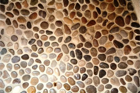 The Pros And Cons Of Pebble Shower Floors 1 River Stone Shower, Stone Shower Floor, River Rock Shower, Stone Floor Bathroom, Pebble Tile Shower, Pebble Shower, Pebble Stone Flooring, Pebble Shower Floor, Rustic Bathroom Shower