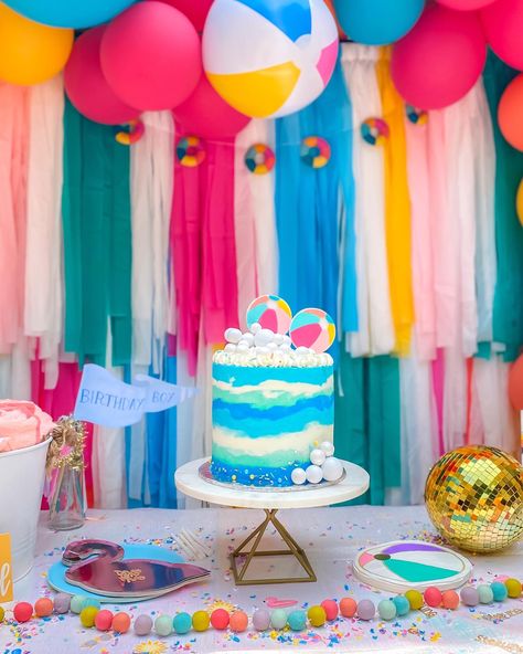 My son turned 5 and we had a Dive into Five themed pool party for him. Beach balls woven into the balloon garland, a big colorful backdrop, and lots of small details tying in the theme made this a pool party to remember! #birthdayparty #party #partydecor #poolparty #boybirthdayparties #birthdaypartyideas #birthday Summer Birthday Themes, Beach Theme Birthday, Beach Ball Party, Pool Party Themes, Pool Party Kids, Splash Party, Beach Birthday Party, Pool Party Decorations, Pool Birthday