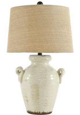 Emelda table lamp illuminates with vintage-inspired style. Antiqued cream glazed ceramic base boasts a crackle effect. Vase shape with the appearance of handles sits beautifully on end table. Perfect for farmhouse and cottage chic spaces. Chic Spaces, Vase Shapes, Ceramic Table Lamp, Room Lamp, Ceramic Base, Antique Lamps, Bedroom Lamps, Unique Lamps, Vintage Table Lamp