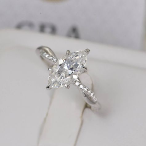 All Diamonds Are Moissanite And There Will Be 2 Gra Certificate For This Ring Specifications: Marquis 9x7mm Big Center Stone *Total Carat Weight: 3.85ct *Diamond Cut: Oval *Color Grade: D *Clarity: Vvs1 *Cut Grade: Excellent *Certificate: Gra Moissanite Certificate *Passes Diamond Test *Metal Finish: 18k White Gold *Metal Material: Solid Sterling Silver *Hallmark: 925 *Lead And Nickel Free *Hypoallergenic *Brand New *Fast Shipping Please Check Out My Other Jewelries. Perfect For Gift, Holiday, C Marquette Diamond Ring, Unique Marquise Engagement Ring Silver, Silver Marquise Engagement Ring, Marquise Engagement Ring Silver, Marquise Engagement Ring White Gold, Rectangle Engagement Rings, Marquis Engagement Rings, Marquise Wedding Ring, Marquise Cut Engagement Ring