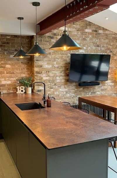 23 Kitchen & Bar Copper Countertop Design Ideas | Sebring Design Build Copper Kitchen Work Surface, Bronze Countertops Kitchen, Rust Kitchen Countertops, Copper Kitchen Benchtop, Copper Painted Countertops, Bar Countertops Ideas, Copper Wrapped Kitchen Island, Charcoal And Copper Kitchen, Bar Countertop Design