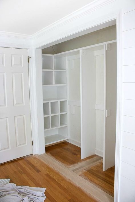 Closet makeover in progress (bifold doors are removed!) - love the cubbies on the end! #closet #makeover #organize #organizing #organization #drapes Modern Minimalist Cozy Bedroom, Armoire Built Into Wall, Side By Side Closet Remodel, How To Widen Closet Door Opening, Remove Closet Wall, Closet Design Layout Small Sliding Doors, Wide Closet Organization, Small Closet Makeover On A Budget, Dresser Inside Closet